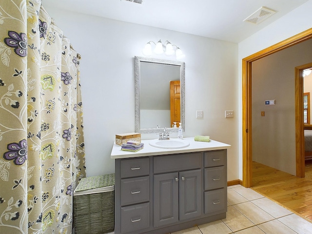 bathroom featuring vanity and tile patterned floors