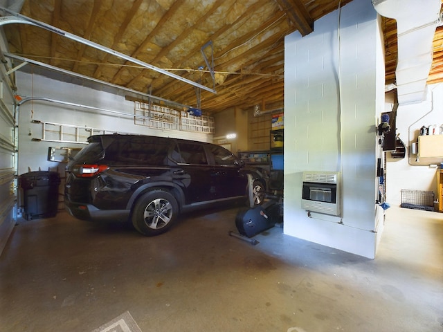 garage featuring heating unit