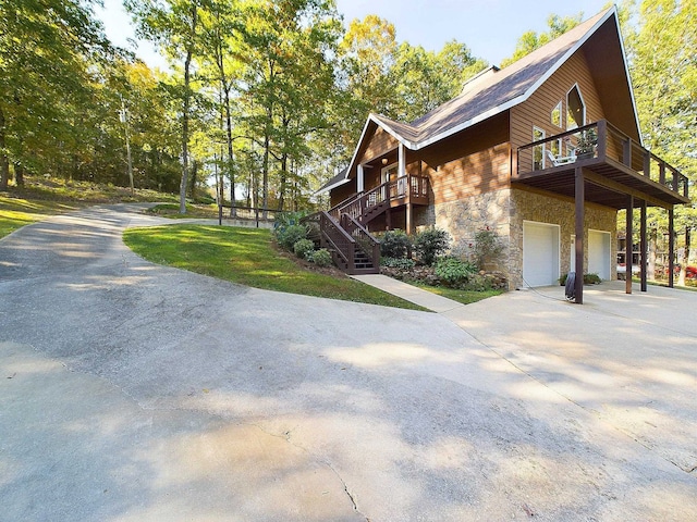 view of side of property with a garage