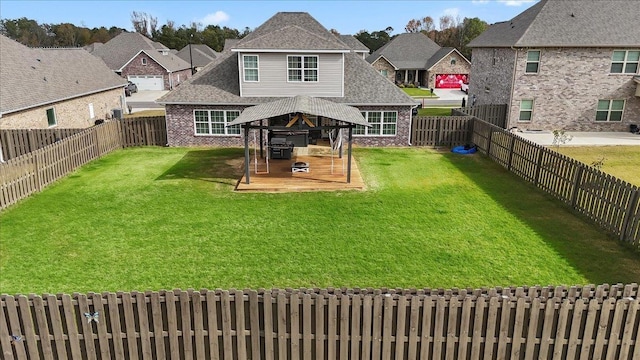 back of property featuring a lawn and a patio