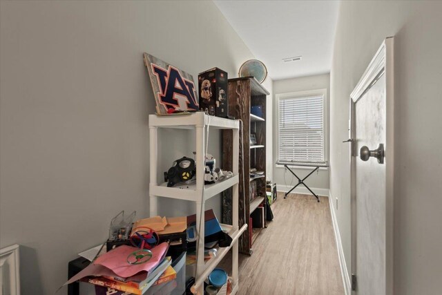 hall featuring hardwood / wood-style flooring