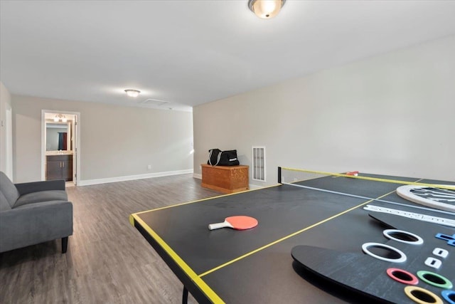 playroom featuring dark hardwood / wood-style floors