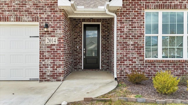 property entrance featuring a garage