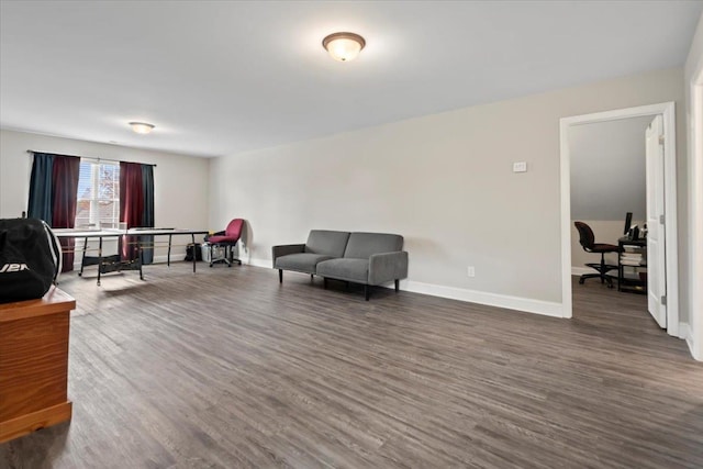 sitting room featuring dark hardwood / wood-style floors