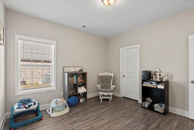 living area featuring dark hardwood / wood-style floors