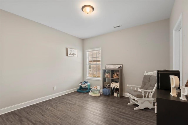 interior space with dark hardwood / wood-style flooring