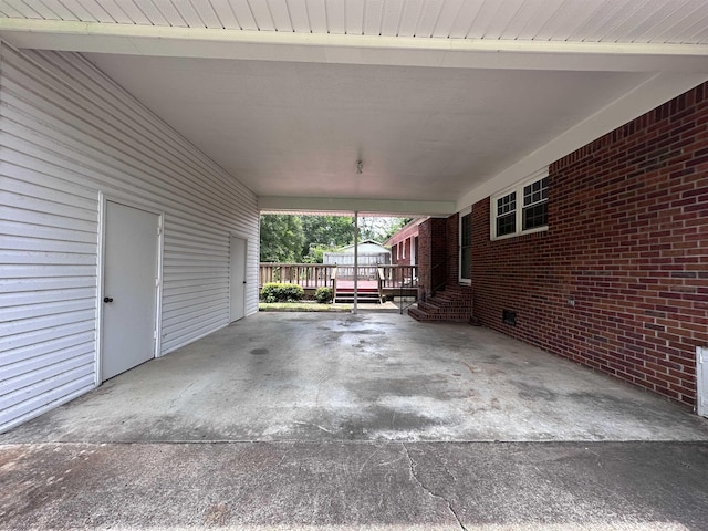  - view of patio featuring a carport