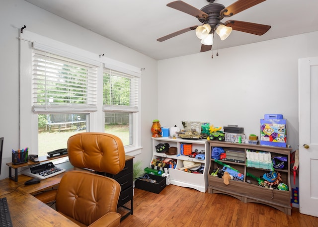  - office with ceiling fan and wood finished floors