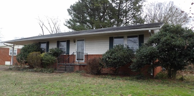 ranch-style house with a front yard