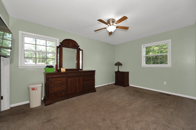  - carpeted bedroom featuring baseboards and ceiling fan