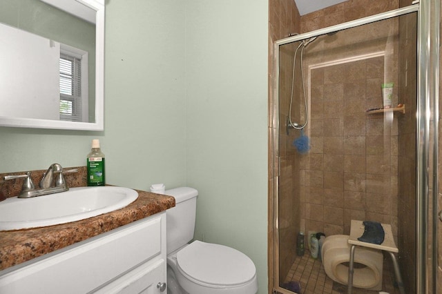  - full bath with vanity and a stall shower