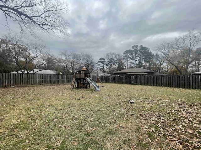 view of yard featuring a playground