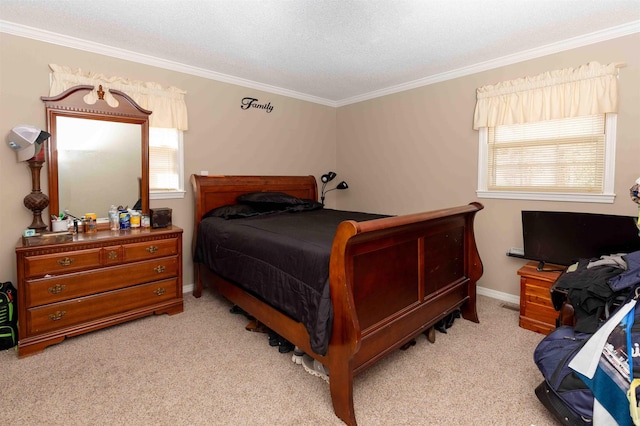 carpeted bedroom with ornamental molding and a textured ceiling