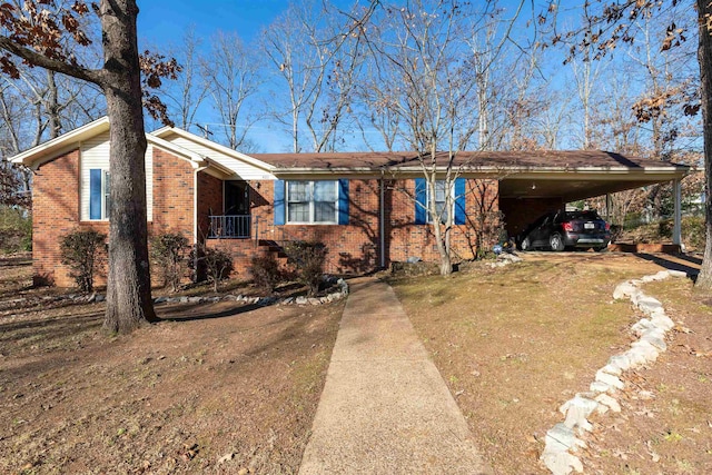 ranch-style house featuring a carport