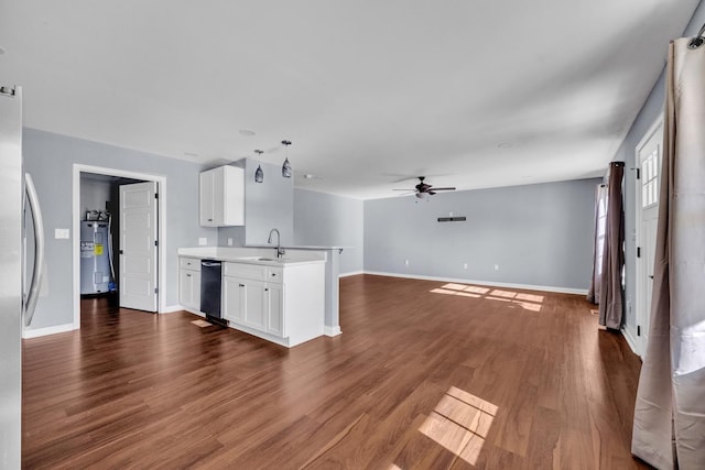 kitchen with white cabinets, dark hardwood / wood-style floors, ceiling fan, and sink