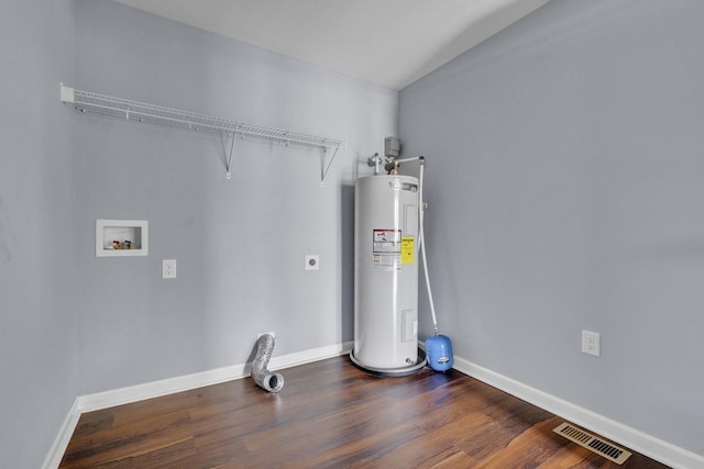 utility room with electric water heater