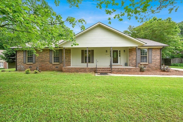  - ranch-style home with a porch, brick siding, and crawl space