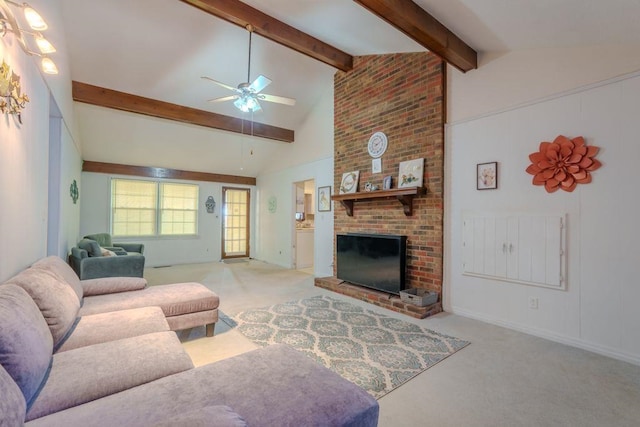 carpeted living room featuring a fireplace, ceiling fan, and vaulted ceiling with beams