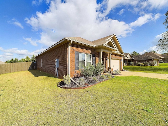 single story home with a front yard and a garage