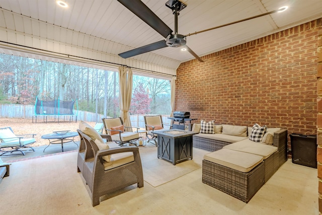 sunroom / solarium with ceiling fan