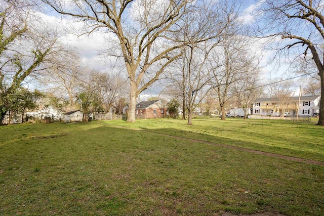 view of yard featuring a residential view