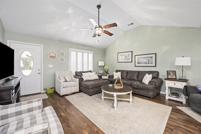 living area with lofted ceiling, ceiling fan, dark wood-style floors, and visible vents