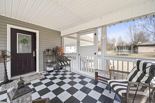 sunroom featuring a healthy amount of sunlight