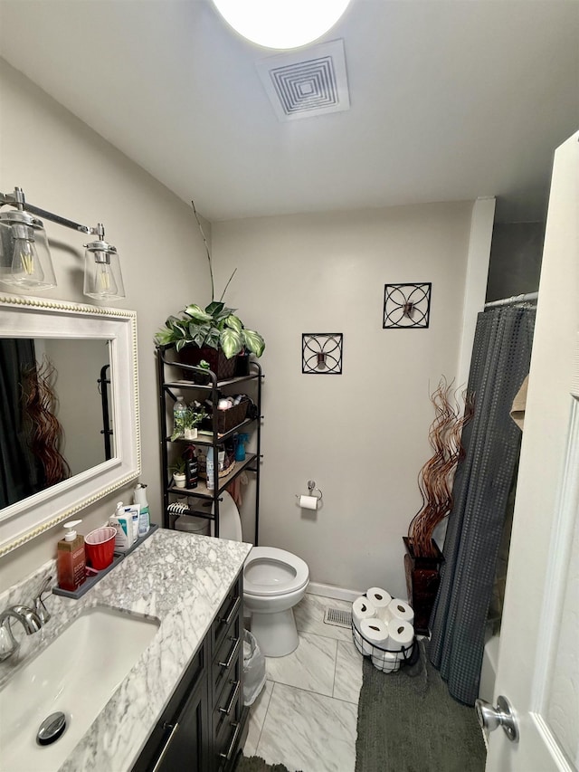 full bathroom with vanity, shower / tub combo with curtain, and toilet