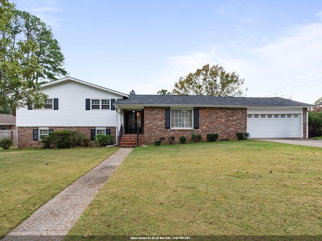 tri-level home with a garage and a front lawn