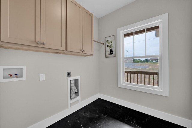  - laundry area featuring hookup for an electric dryer, cabinet space, baseboards, and hookup for a washing machine