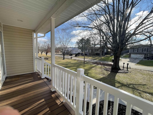 wooden deck featuring covered porch