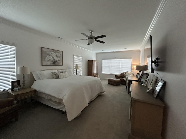  - carpeted bedroom featuring ornamental molding and ceiling fan
