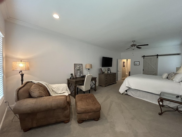  - bedroom featuring crown molding, carpet floors, a ceiling fan, a barn door, and baseboards