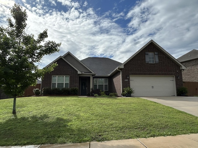 - view of front of property with driveway and brick siding