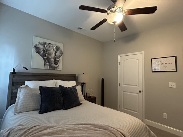  - bedroom with baseboards and a ceiling fan