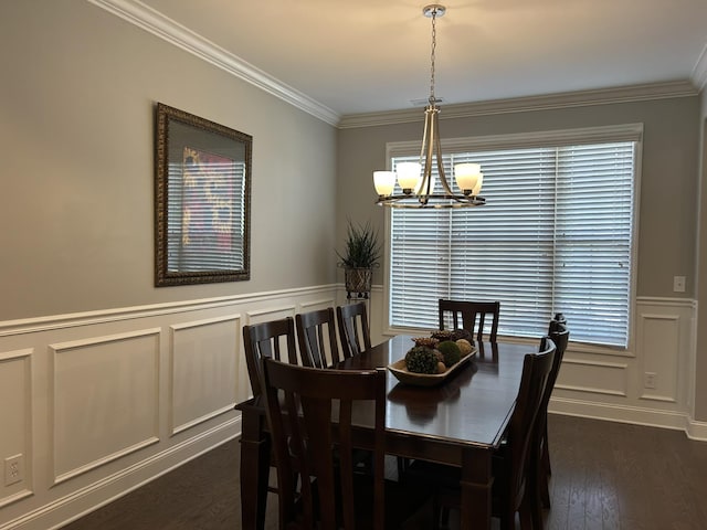 - dining space featuring a chandelier, a decorative wall, crown molding, dark wood-style flooring, and healthy amount of natural light
