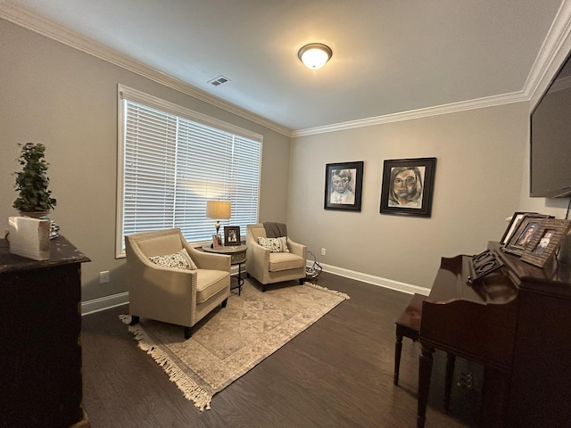  - living room with crown molding, baseboards, and wood finished floors