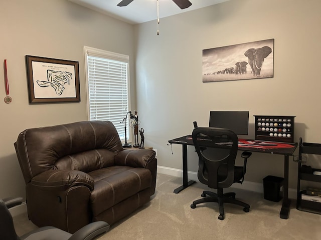  - office space with carpet floors, a ceiling fan, and baseboards