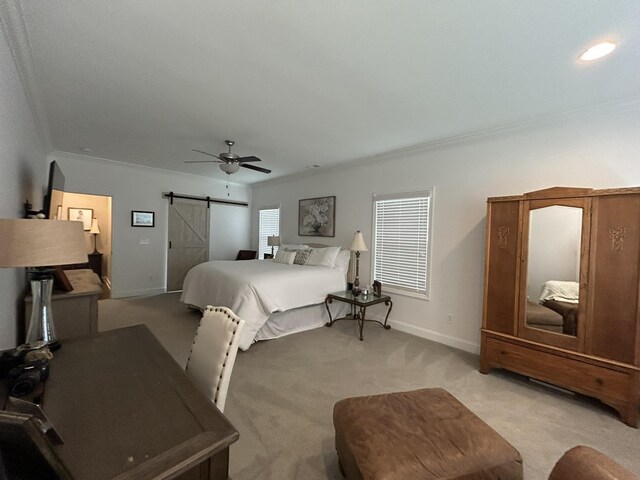  - bedroom featuring light carpet, ornamental molding, a barn door, baseboards, and a ceiling fan