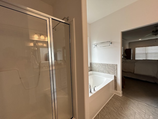  - bathroom featuring ensuite bathroom, a stall shower, and a garden tub