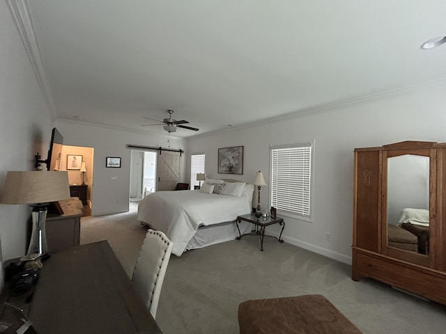  - bedroom featuring ornamental molding, light carpet, a barn door, ceiling fan, and baseboards