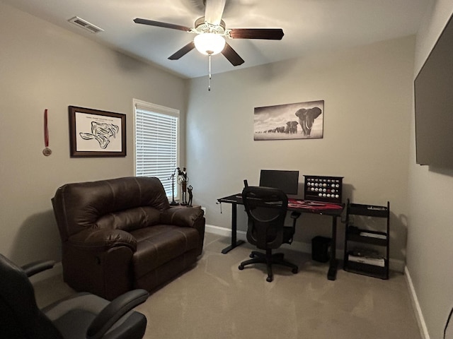  - office area with baseboards, a ceiling fan, and carpet flooring