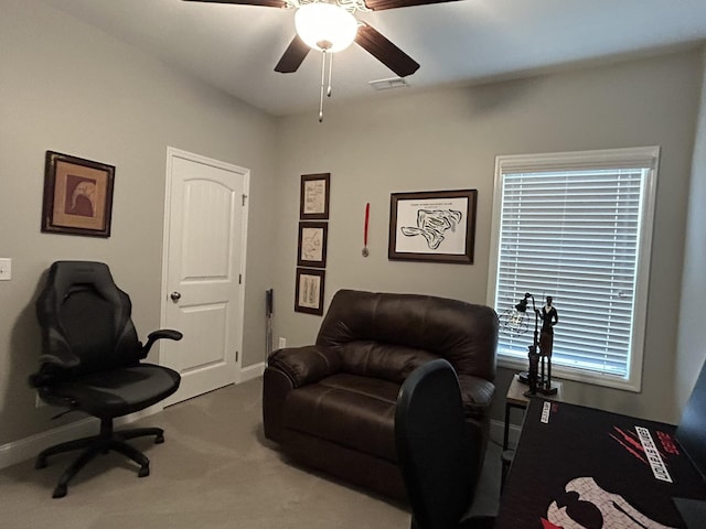  - office space featuring a ceiling fan, carpet floors, and baseboards