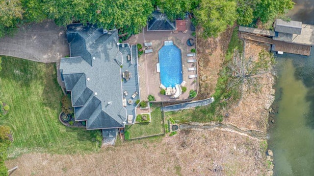  - aerial view of property and surrounding area with a pool