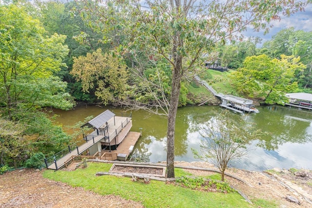  - dock area with a water view and boat lift