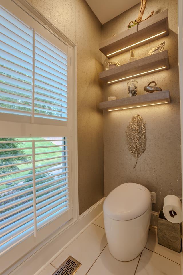  - bathroom with tile patterned flooring and toilet