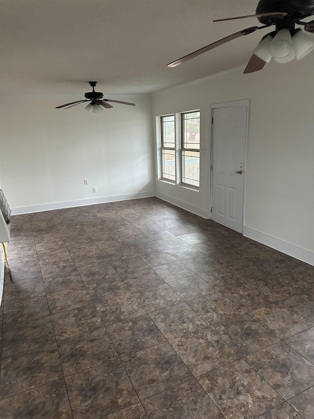 unfurnished room featuring ceiling fan