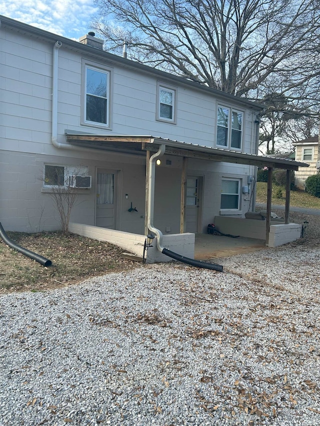 rear view of house with a patio area