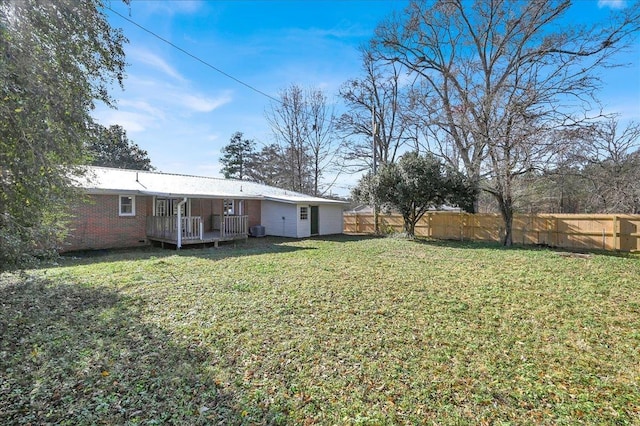 view of yard featuring a deck