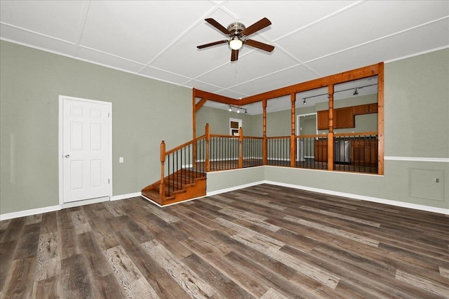 spare room with hardwood / wood-style flooring and ceiling fan